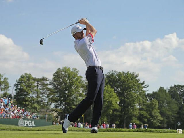 The Latest: Round 2 of PGA resumes amid rain at Baltusrol