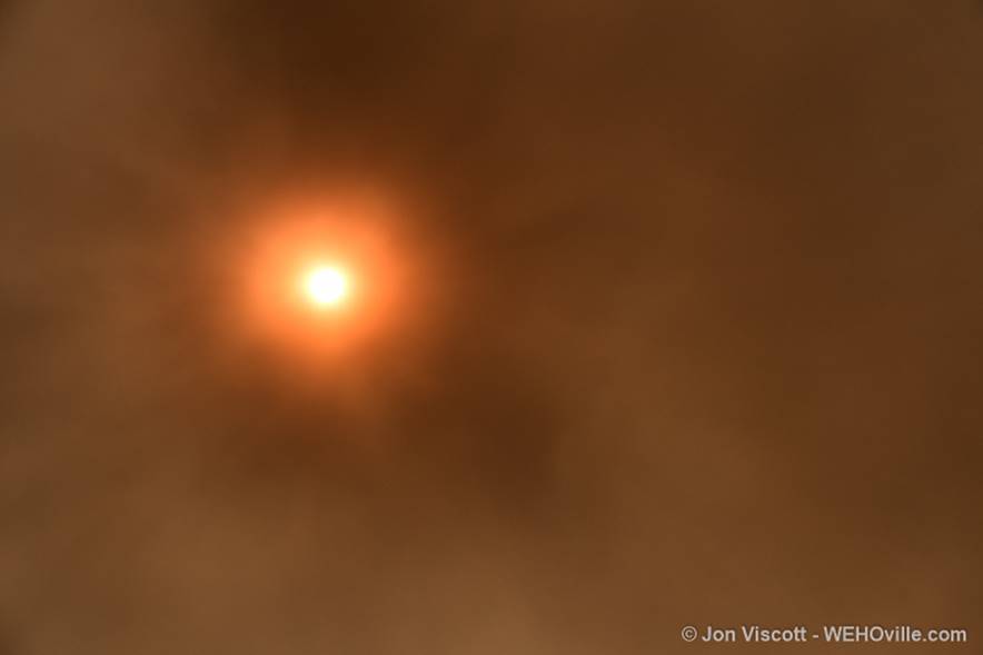 The sun over West Hollywood obscured by smoke from the Santa Clarita Valley fire