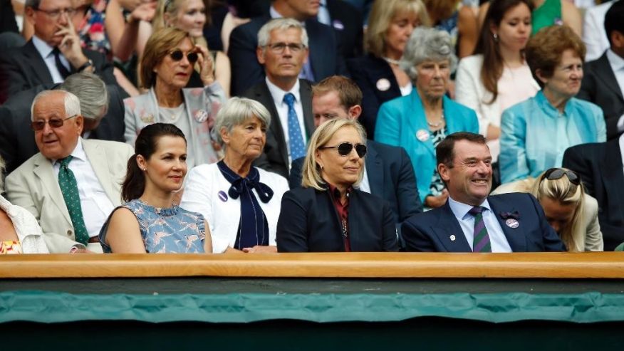 Former tennis star Martina Navratilova front centre and her wife Julia Lemigova front left sit in the Royal Box during day seven of the Wimbledon Tennis Championships in London Sunday