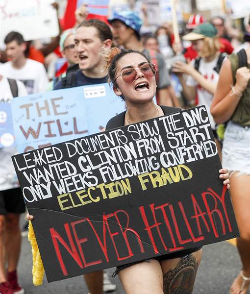 Supporters of Sen. Bernie Sanders I-Vt. march during a protest in downtown on Sunday