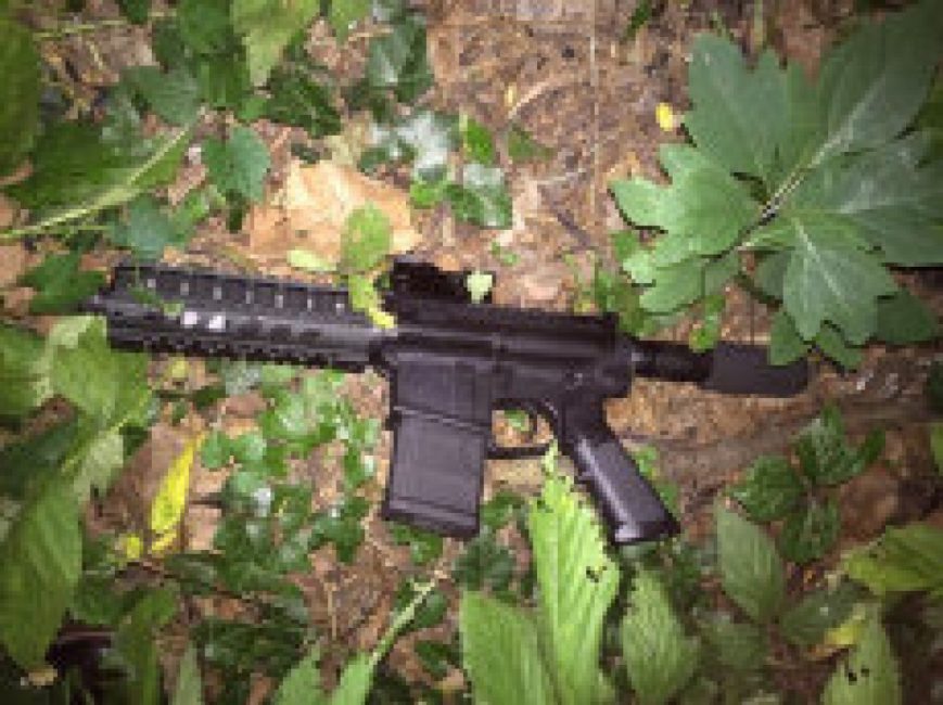 Baltimore Police shows a gun recovered from a shooting scene in Baltimore Thursday July 14. Baltimore police officers responding to the sound of gunshots near an apartment building fatally shot a man who fired at them with an AR-15