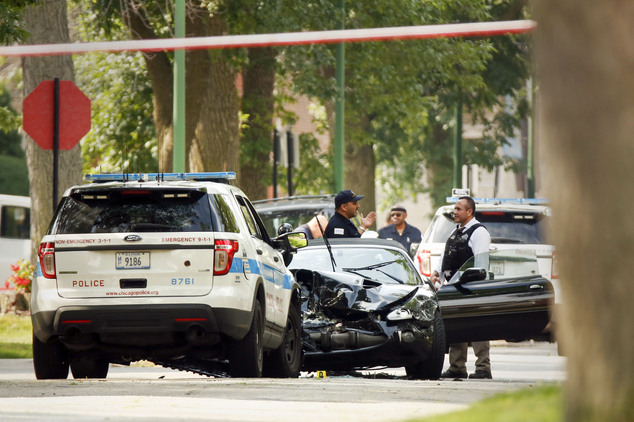 Chicago police investigate a police-involved fatal shooting in the 7300 block of South Merrill Avenue in Chicago's South Shore neighborhood on Friday July 2