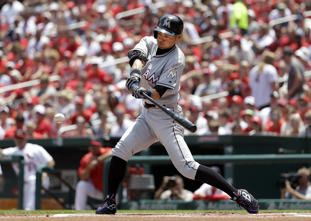 Miami Marlins Ichiro Suzuki singles during the first inning of a baseball game against the St. Louis Cardinals Sunday