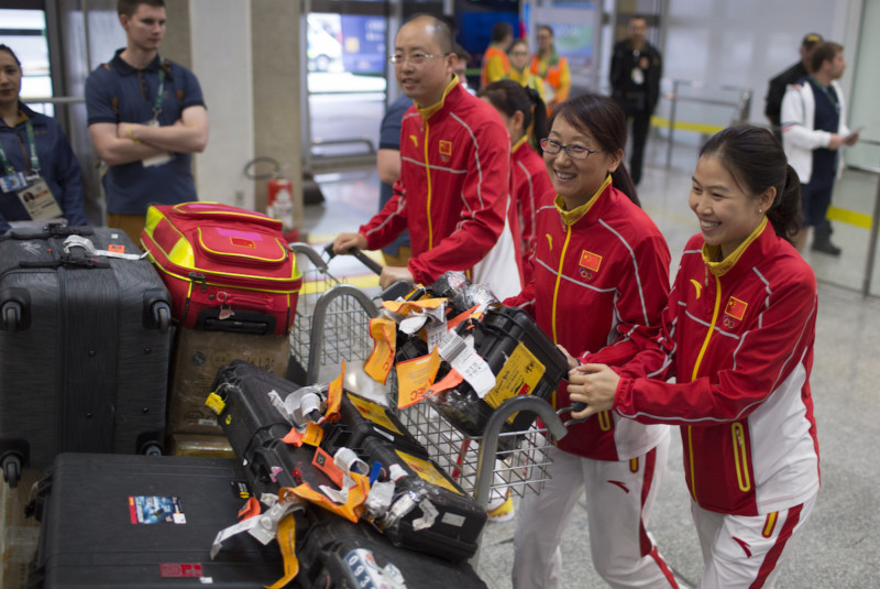 Members of the Chinese olympic team arrive to the Rio de Janeiro International Airport in Rio de Janeiro Brazil Thursday