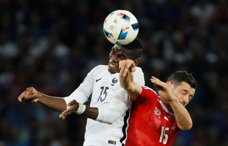 Switzerland's Blerim Dzemaili and France's Paul Pogba REUTERS  Gonzalo Fuentes Livepic