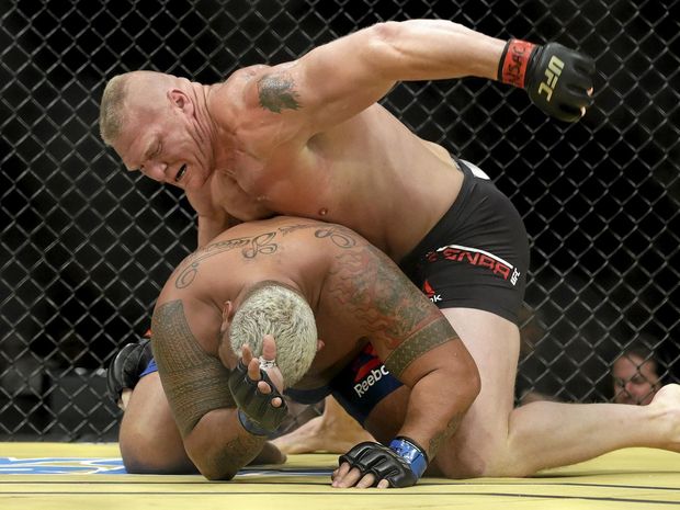 TOO GOOD Brock Lesnar hammers Mark Hunt during their heavyweight mixed martial arts bout at UFC 200 in Las Vegas