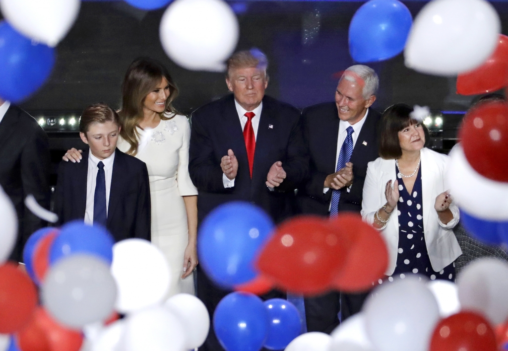 Republican presidential candidate Donald Trump center along with from left son Barron wife Melania Gov. Mike Pence of Indiana and Pence's wife Karen after Trump's address to delegates during the final day session of the Republican National Conventio