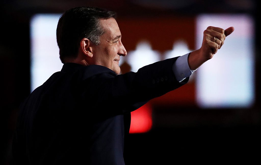 Ted Cruz gestures as he walks on stage to deliver a speech on the third day of the Republican National Convention