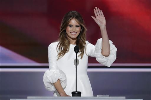 Melania Trump wife of Republican Presidential Candidate Donald Trump waves as she speaks during the opening day of the Republican National Convention in Cleveland Monday