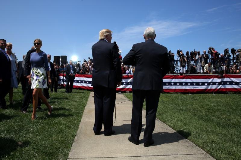 Republican presidential nominee Donald Trump and vice presidential nominee Mike Pence speak at an event in Cleveland U.S