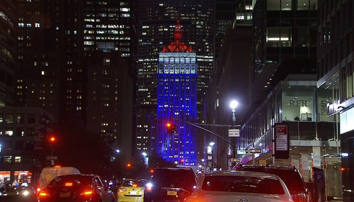 The Helmsley Hotel in New York is lit up like the French flag following the terrorist attack in Nice France