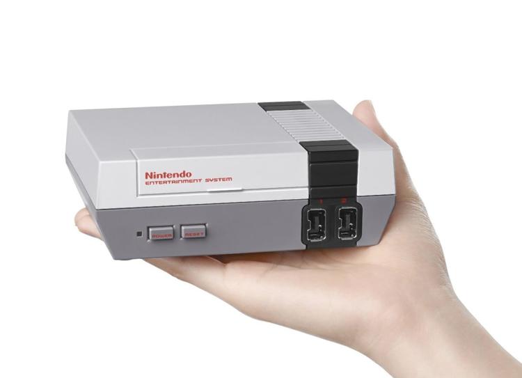 The Nintendo Mini so small you can literally grab one with your right hand as you fork over your money with your left