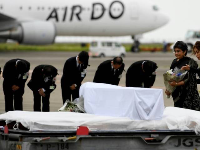 The bodies of seven Japanese nationals killed in a bloody restaurant attack in Dhaka were returned home early Tuesday on a government plane