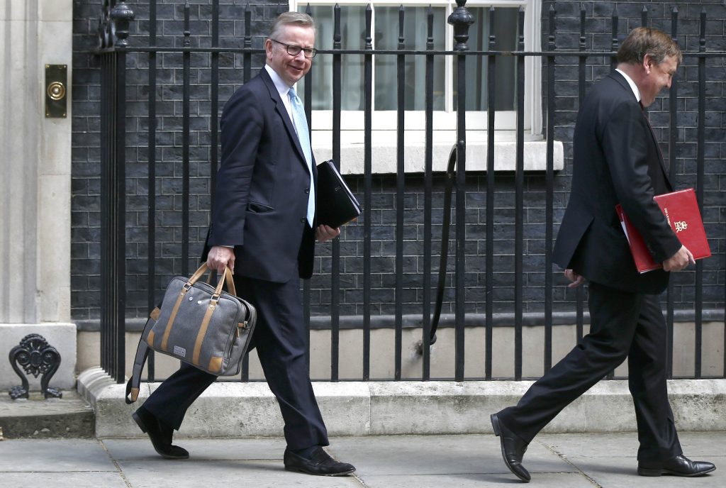 Britain's Justice Secretary Michael Gove and Culture Secretary John Whittingdale leave after a cabinet meeting at number 10 Downing Street in central London Britain