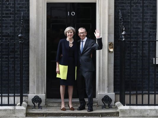 Queen Elizabeth II welcomes Theresa May at the start of an audience in Buckingham Palace London where she invited the former home secretary to become prime minister and form a new government on Wednesday