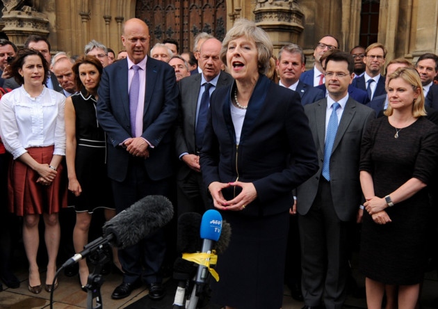 Theresa May outside the Houses of Parliament in Westminster London after she secured her place as the UK