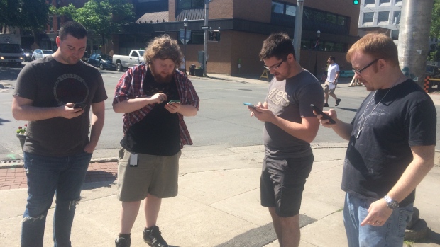 These da Vinci College students on a break from class are playing Pokémon Go- trying to capture a Beedrill