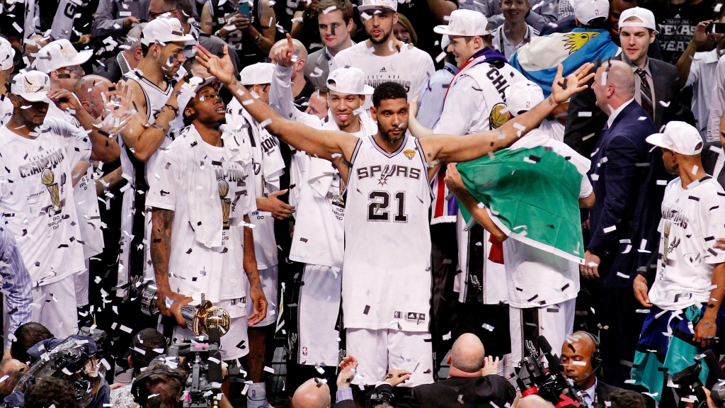 Tim Duncan celebrates after defeating the Miami Heat in game five of the 2014 NBA Finals