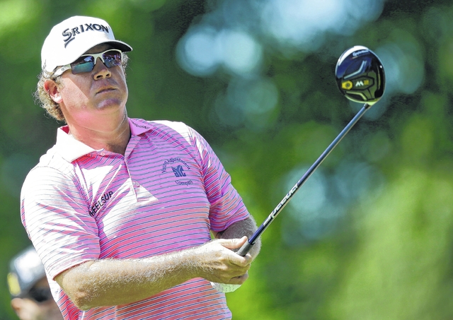 Tony Dejak | AP William Mc Girt shot a 6-under-par 64 in his debut at the WGC-Bridgestone Invitational taking a three-shot lead into the second round