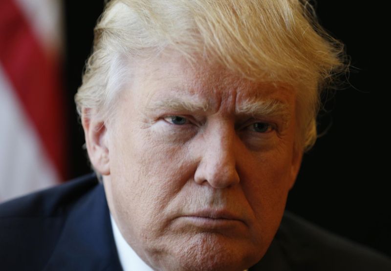 Republican Presidential candidate Donald Trump listens to a question during an interview after a rally in Virginia Beach Va. Monday