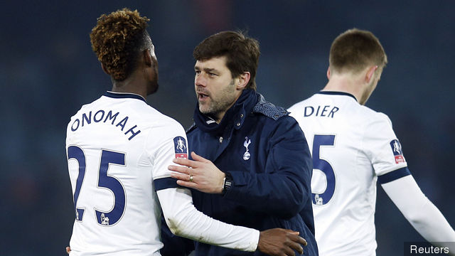 Tottenham manager Mauricio Pochettino celebrates with Joshua Onomah after the game