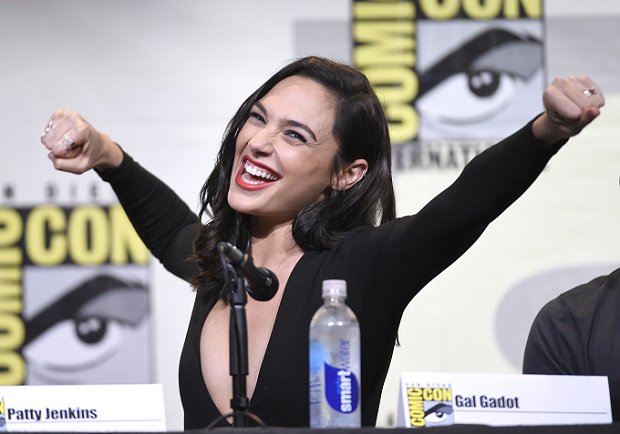 Gal Gadot makes a Wonder Woman pose at the'Wonder Woman panel on day 3 of Comic Con International on Saturday