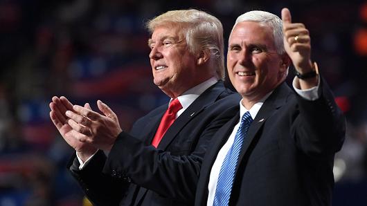 Republican Presidential candidate Donald Trump and Republican Vice Presidential candidate Mike Pence celebrate during the final day of the Republican National Convention on Thursday