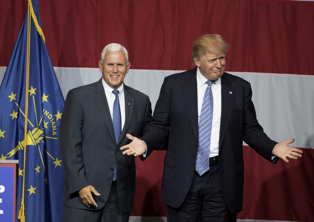 Presumptive Republican presidential nominee Donald Trump and Indiana Gov. Mike Pence take the stage during a campaign rally at Grant Park Event Center in Westfield Indiana