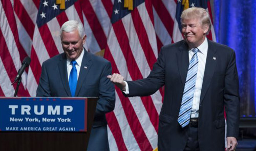 Republican presidential candidate Donald Trump introduces Gov. Mike Pence R-Ind. during a campaign event in New York