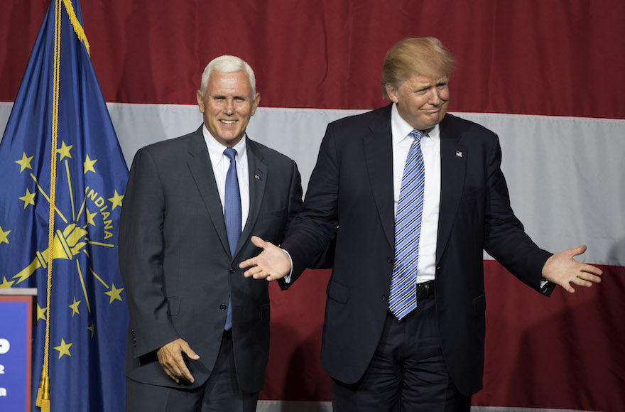 Donald Trump and Indiana Governor Mike Pence onstage during a campaign rally at Grant Park Event Center in Westfield Indiana