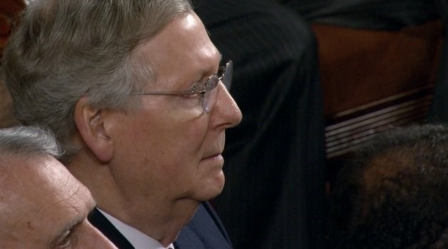 Republican Leader in the U.S. Senate Mitch Mc Connell listens to President Barack Obama's State of the Union Address in the House Chamber at the U.S. Capitol before a joint session of Congress on Tuesday