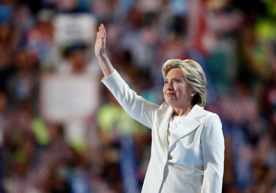 Democratic presidential nominee Hillary Clinton waves after taking the stage during the final day of the Democratic National Convention in Philadelphia, Thursday