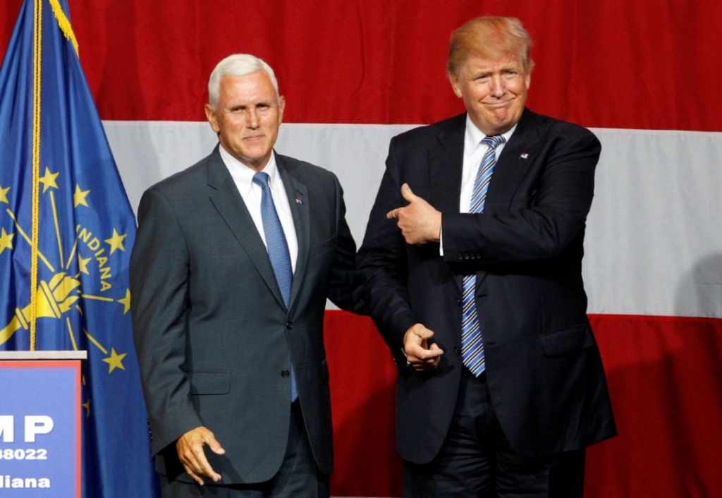 Republican presidential candidate Donald Trump right and Indiana Governor Mike Pence who is in the running to be Trump's running mate