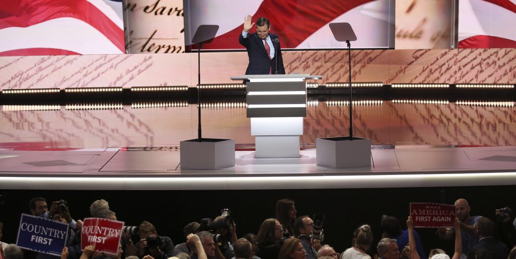 Republican presidential nominee Donald Trump points at the gathered media during his walk through at the Republican National Convention in Cleveland U.S