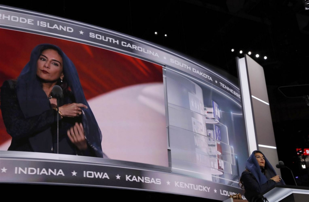 Image Indian-born Sikh Republican activist Harmeet Dhillon adjusts her scarf as she prepares to deliver the invocation at the Republican National Convention in Cleveland