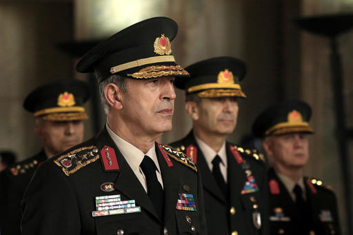 Chief of general staff General Hulusi Akar stands with other Military chiefs during a Supreme Military Council meeting with the Prime Minister Binali Yildirim at Ataturk's mausoleum in Ankara