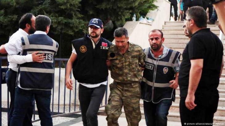 A rebel soldier is brought to court in Mugla province