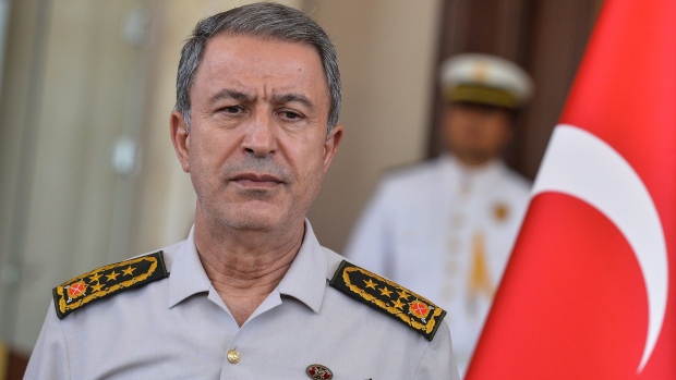 Turkey's Chief of Staff Gen. Hulusi Akar mattends a press conference with Prime Minister Binali Yildirim in Ankara Turkey Saturday