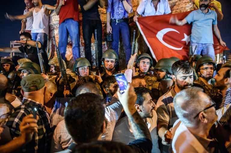 AFP  Ozan Kose Turkish solders stand guard at Taksim Square as people protest against the military coup in Istanbul