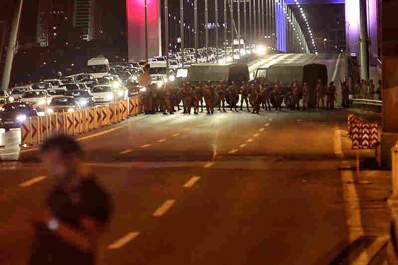 Turkish soldiers block Istanbul's Bosporus bridge on Friday while soldiers also occupied streets in the capital of Ankara