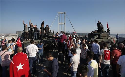 Turkish people celebrate as Turkish police officers loyal