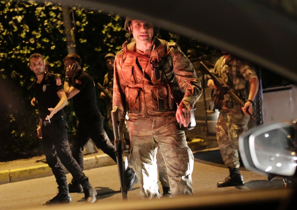 Turkish security officers detained police dressed in black as they shut down the Bosphorus Bridge Yasin Akgul  Getty Images