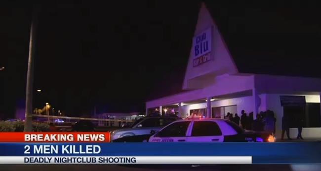 In this frame from video people gather near the scene of a fatal shooting at Club Blu nightclub in Fort Myers Fla. Monday