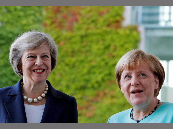 UK PM Theresa May with German Chancellor Angela Merkel in Berlin on Thursday