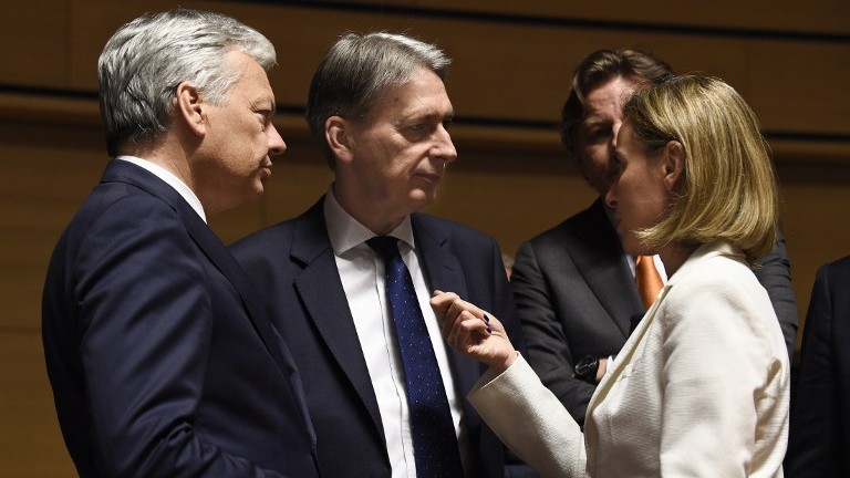 High Representative of the Union for Foreign Affairs and Security Policy Federica Mogherini right talks to Belgian foreign minister Didier Reynders left and British Foreign Secretary Philip Hammond at a Foreign Affairs meeting in Luxembourg