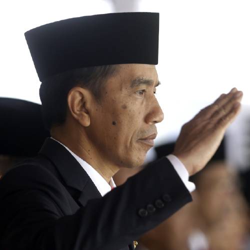 Indonesia's President Joko Widodo salutes during a flag raising ceremony for Independence Day at Merdeka Palace in Jakarta Indonesia. Indonesia has beefed up security at Nusa Kambangan prison island