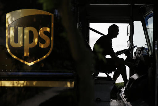 United Parcel Service driver starts his truck after making a delivery in Cumming Ga. UPS reports financial results on Friday