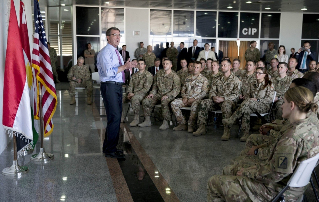 US Defense Secretary Ash Carter is welcomed by Iraqi Defense Minister Khaled al Obaidi in Baghdad Iraq