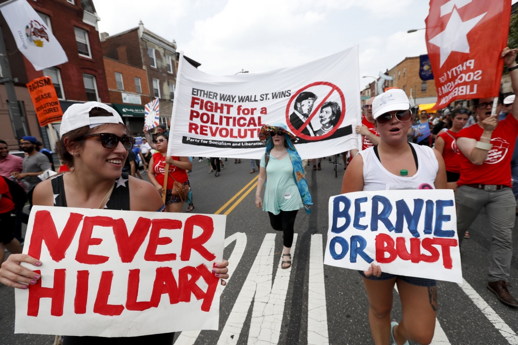 Supporters of Sen. Bernie Sanders I-Vt. march during a protest in downtown on Monday