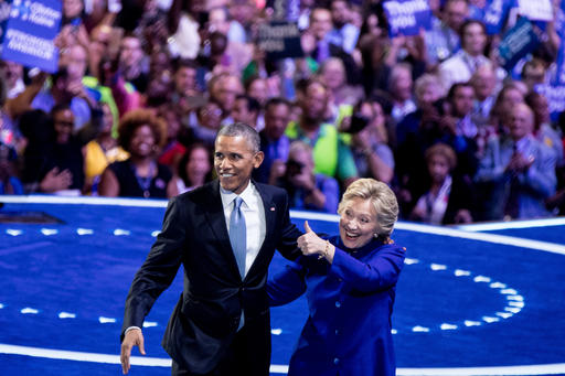 President Barack Obama and Democratic presidential candidate Hillary Clinton appear on stage together on the third day session of the Democratic National Convention in Philadelphia Wednesday